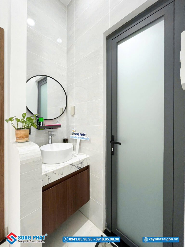 Khu vực lavabo tinh giản, hài hòa với tổng thể không gian.