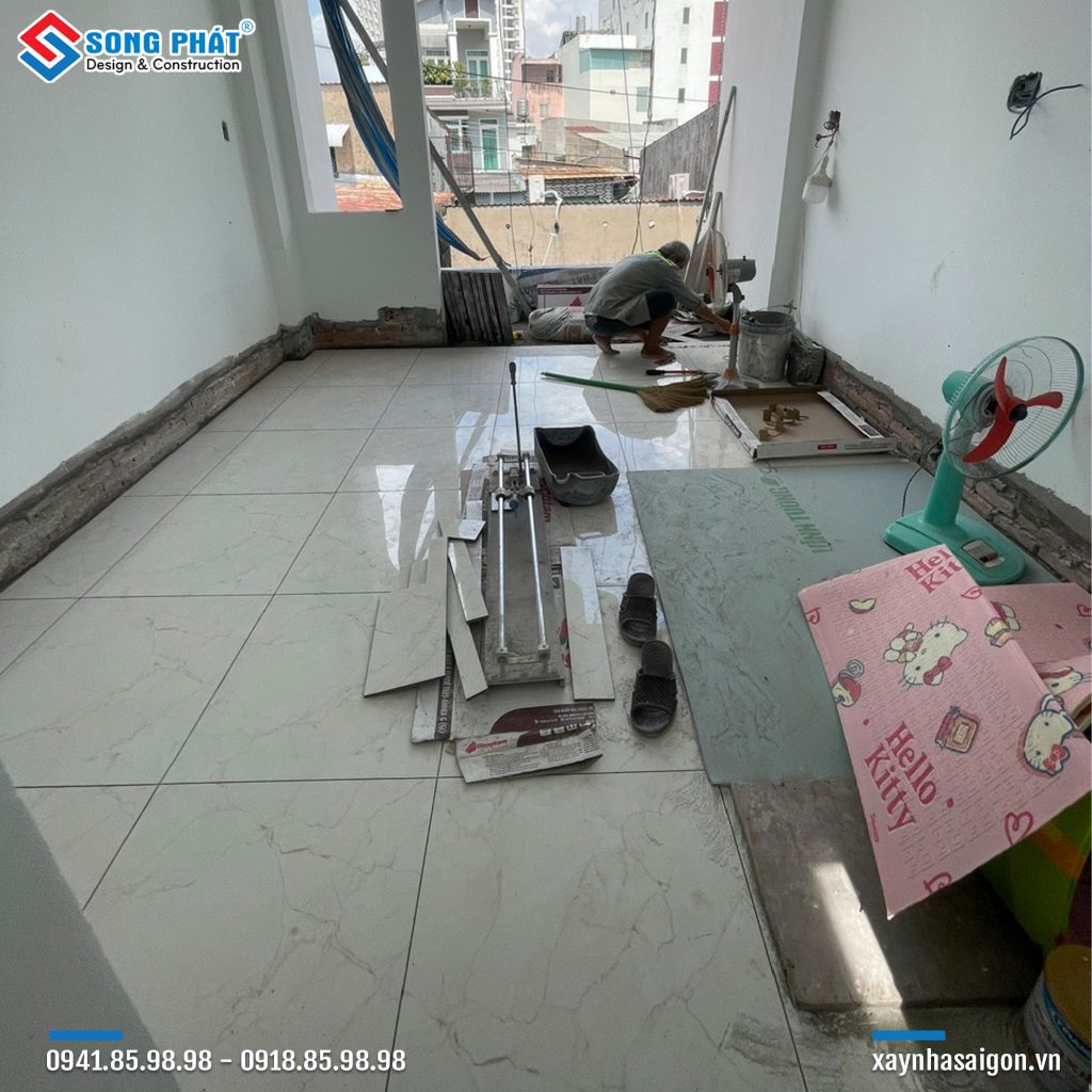 07/09 Lát gạch lầu 1