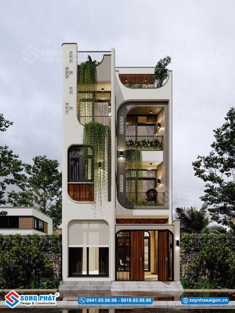 Nhà 4 tầng 6x8m với mặt tiền bo cong mềm mại, điểm xuyến mảng xanh cho cảm giác nhẹ nhàng và gần gũi.